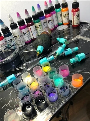 Migração de tinta de tatuagem: a ciência por trás de por que sua tatuagem fic...